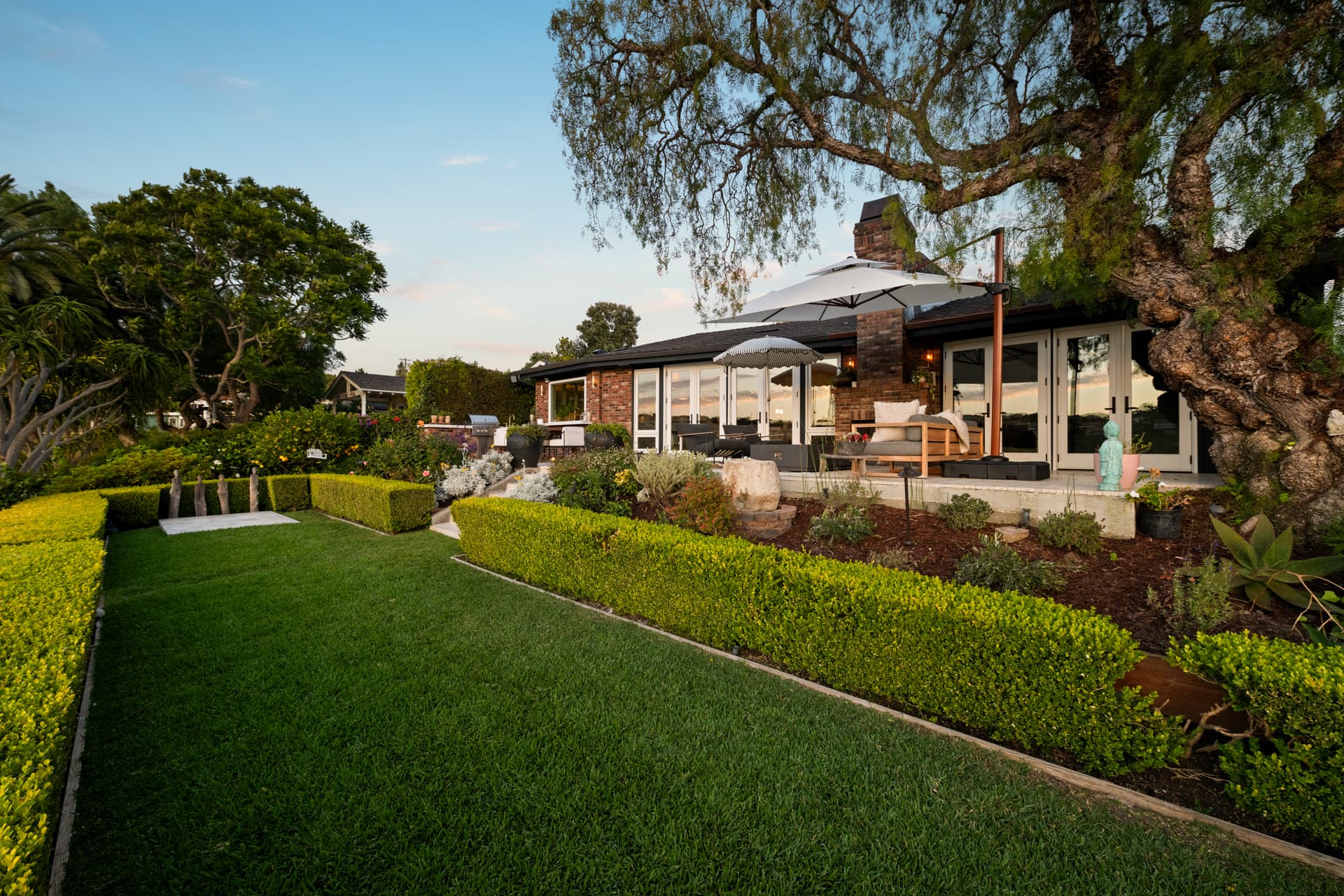 Pop No. 001 - The Sovereign, 1888 Temple Hills Drive at dusk